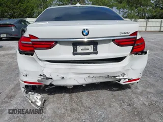 2017 BMW 7 Series 740i z VIN WBA7E2C53HG740273, wystawiony jako IAAI lot #42475769 z przebiegiem Nie podano mil oraz . Historia ofert i sprzedaży dostępna na DreamBid. Obrazek 6.