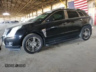 2012 Cadillac SRX Premium Collection z VIN 3GYFNFE30CS599863, wystawiony jako Copart lot #61249995 z przebiegiem 144 740 mil mil oraz Czysty tytuł • Clean title. Historia ofert i sprzedaży dostępna na DreamBid. Obrazek 1.