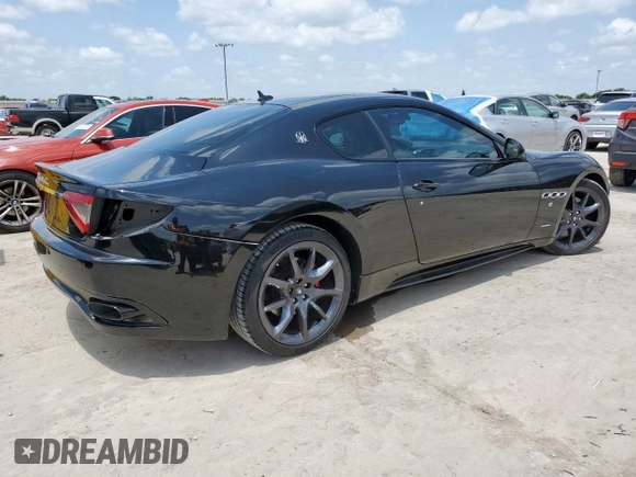 2014 Maserati GranTurismo Sport z VIN ZAM45VLAXE0083282, wystawiony jako Copart lot #61799155 z przebiegiem 71 517 mil mil oraz Szkoda całkowita • Salvage title. Historia ofert i sprzedaży dostępna na DreamBid. Obrazek 3.