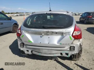 2014 Ford Focus Electric with VIN 1FADP3R45EL287285, listed as a Copart auction lot 74148154 with 64,543 mi miles and Salvage title. Bid and sale history available at DreamBid. Image 6.