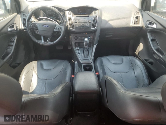 2015 Ford Focus SE with VIN 1FADP3F23FL319168, listed as a Copart auction lot 64411645 with 213,852 mi miles and Clean title. Bid and sale history available at DreamBid. Image 8.