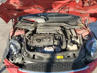 2013 MINI Convertible S with VIN WMWZP3C50DT550554, listed as a Copart auction lot 88415495 with 95,295 mi miles and Salvage title. Bid and sale history available at DreamBid. Image 12.