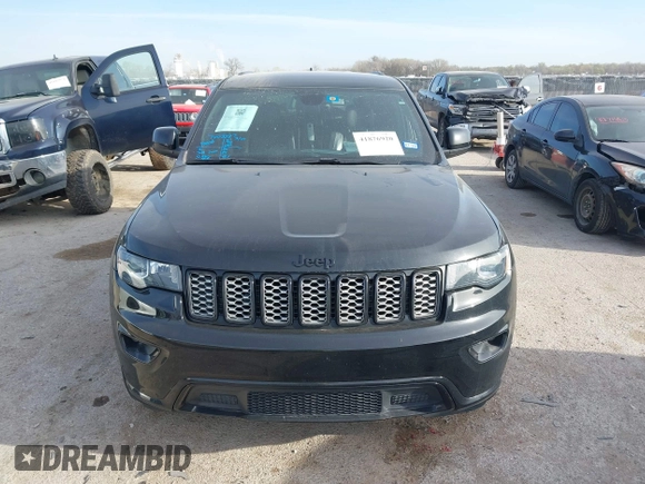 2018 Jeep Grand Cherokee Laredo E with VIN 1C4RJEAG4JC311699, listed as a IAAI auction lot 41876920 with 42,584 mi miles and . Bid and sale history available at DreamBid. Image 12.