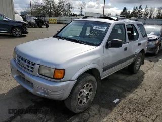 1998 Isuzu Rodeo S z VIN 4S2CK58W9W4302907, wystawiony jako Copart lot #48997335 z przebiegiem 162 858 mil mil oraz Szkoda całkowita • Salvage title. Historia ofert i sprzedaży dostępna na DreamBid. Obrazek 1.