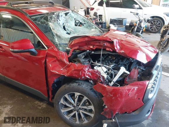 2024 Toyota Corolla Cross XLE with VIN 7MUDAABG3RV088783, listed as a IAAI auction lot 42433593 with 11,687 mi miles and . Bid and sale history available at DreamBid. Image 6.