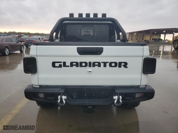 2022 Jeep Gladiator Rubicon with VIN 1C6JJTBG5NL152818, listed as a Copart auction lot 57170834 with 9,579 mi miles and Salvage Title. Bid and sale history available at carsss.com. Image 6.