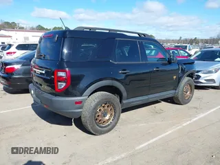 2023 Ford Bronco Sport Badlands z VIN 3FMCR9D95PRD26169, wystawiony jako IAAI lot #41723643 z przebiegiem 21 181 mil mil oraz . Historia ofert i sprzedaży dostępna na DreamBid. Obrazek 4.