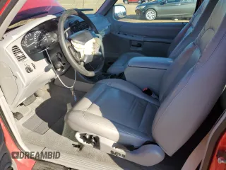 1999 Ford Explorer with VIN 1FMYU22E5XUC72067, listed as a Copart auction lot 79531894 with 109,134 mi miles and Salvage title. Bid and sale history available at DreamBid. Image 7.