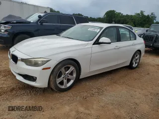2014 BMW 3 Series 328i with VIN WBA3A5C59EP601899, listed as a Copart auction lot 61430675 with 205,396 mi miles and Salvage title. Bid and sale history available at DreamBid. Image 1.