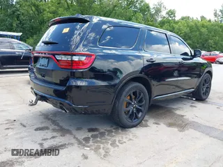 2019 Dodge Durango R/T with VIN 1C4SDJCT6KC692551, listed as a IAAI auction lot 42320969 with 87,502 mi miles and . Bid and sale history available at DreamBid. Image 4.