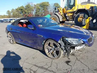 2018 BMW M6 with VIN WBS6G9C56JBM23844, listed as a IAAI auction lot 41206052 with 32,670 mi miles. Bid and sale history available at carsss.com. Image 1.