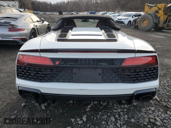 2020 Audi R8 Spyder performance z VIN WUA4BCFX3L7901606, wystawiony jako Copart lot #50161615 z przebiegiem 3 669 mil mil oraz Nie do naprawy • Non repairable. Historia ofert i sprzedaży dostępna na DreamBid. Obrazek 6.