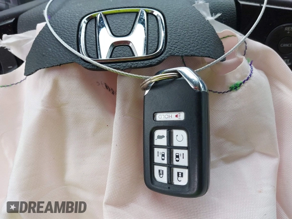 2022 Honda Odyssey Elite z VIN 5FNRL6H99NB066589, wystawiony jako IAAI lot #41868201 z przebiegiem 79 113 mil mil oraz . Historia ofert i sprzedaży dostępna na DreamBid. Obrazek 11.