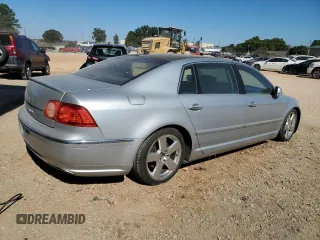 2004 Volkswagen Phaeton V8 z VIN WVWAF63D748010147, wystawiony jako Copart lot #75843654 z przebiegiem 147 157 mil mil oraz Nie do naprawy. Historia ofert i sprzedaży dostępna na DreamBid. Obrazek 3.