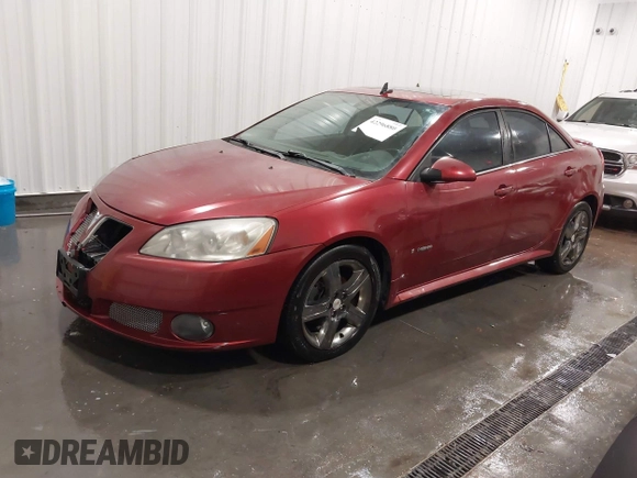 2009 Pontiac G6 GXP 1SA with VIN 1G2ZM577X94157511, listed as a IAAI auction lot 42296880 with 143,960 mi miles and . Bid and sale history available at DreamBid. Image 2.