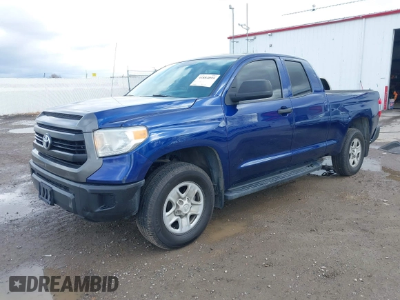 2014 Toyota Tundra SR with VIN 5TFUM5F17EX056082, listed as a IAAI auction lot 41884095 with 155,036 mi miles and . Bid and sale history available at DreamBid. Image 2.