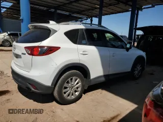 2015 Mazda CX-5 Touring with VIN JM3KE2CY2F0478167, listed as a Copart auction lot 52772805 with 135,492 mi miles and Salvage Title. Bid and sale history available at carsss.com. Image 3.