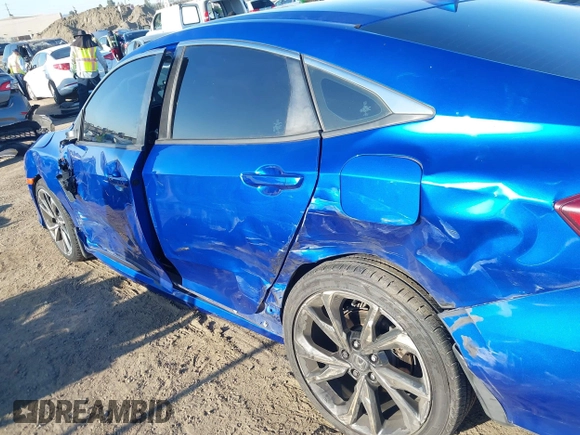 2018 Honda Civic Si with VIN 2HGFC1E56JH700325, listed as a IAAI auction lot 42007770 with 101,386 mi miles and . Bid and sale history available at DreamBid. Image 6.