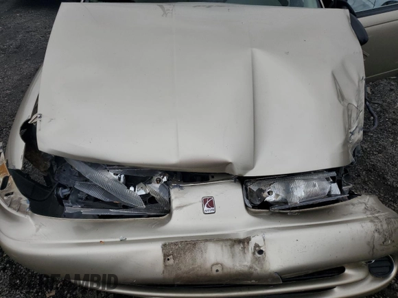 1997 Saturn SW z VIN 1G8ZK827XVZ120119, wystawiony jako Copart lot #57083245 z przebiegiem 199 971 mil mil oraz Szkoda całkowita • Salvage title. Historia ofert i sprzedaży dostępna na DreamBid. Obrazek 11.
