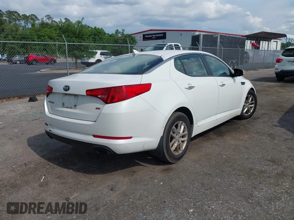 2013 Kia Optima LX z VIN KNAGM4A79D5312328, wystawiony jako IAAI lot #42356029 z przebiegiem 194 562 mil mil oraz . Historia ofert i sprzedaży dostępna na DreamBid. Obrazek 4.