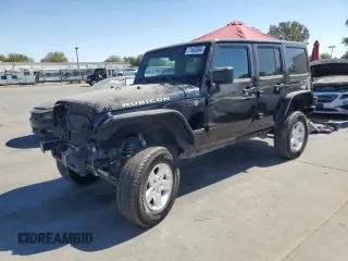 2013 Jeep Wrangler Unlimited Rubicon 10th Anniversary with VIN 1C4HJWFG4DL550832, listed as a Copart auction lot 71633684 with 60,759 mi miles and Salvage title. Bid and sale history available at DreamBid. Image 1.