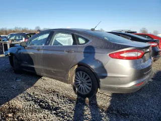 2013 Ford Fusion SE Hybrid with VIN 3FA6P0LU1DR232204, listed as a Copart auction lot 41450515 with 87,616 mi miles and Salvage Title. Bid and sale history available at DreamBid. Image 2.