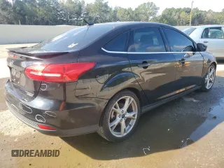 2015 Ford Focus Titanium with VIN 1FADP3J29FL311471, listed as a Copart auction lot 87805235 with 195,026 mi miles and Salvage Title. Bid and sale history available at carsss.com. Image 3.