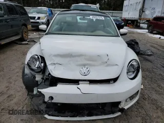 2014 Volkswagen Beetle 2.5L w/Sun with VIN 3VWJP7AT7EM613977, listed as a Copart auction lot 89251315 with 101,885 mi miles and Salvage Title. Bid and sale history available at DreamBid. Image 5.