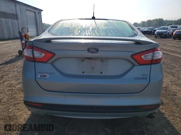 2013 Ford Fusion SE Hybrid z VIN 3FA6P0LU3DR353512, wystawiony jako Copart lot #63551325 z przebiegiem Nie podano mil oraz Czysty tytuł • Clean title. Historia ofert i sprzedaży dostępna na DreamBid. Obrazek 6.