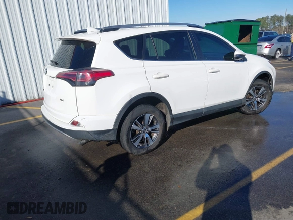 2018 Toyota RAV4 XLE with VIN JTMWFREV7JJ743297, listed as a IAAI auction lot 41579019 with 102,442 mi miles. Bid and sale history available at carsss.com. Image 4.