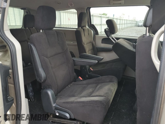 2014 Dodge Grand Caravan SXT z VIN 2C4RDGCG1ER214411, wystawiony jako Copart lot #55497065 z przebiegiem 176 662 mil mil oraz Czysty tytuł • Clean title. Historia ofert i sprzedaży dostępna na DreamBid. Obrazek 11.