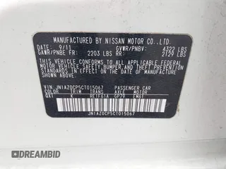 2012 Nissan LEAF SL with VIN JN1AZ0CP5CT015067, listed as a IAAI auction lot 42120094 with 57,793 mi miles. Bid and sale history available at carsss.com. Image 9.