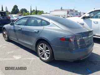 2014 Tesla Model S 60 z VIN 5YJSA1S16EFP40968, wystawiony jako IAAI lot #42331754 z przebiegiem 159 717 mil mil oraz . Historia ofert i sprzedaży dostępna na DreamBid. Obrazek 3.