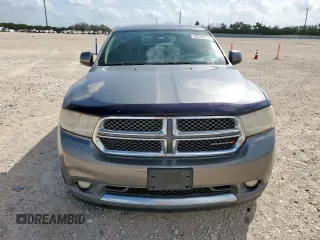 2013 Dodge Durango SXT with VIN 1C4RDHAGXDC592730, listed as a Copart auction lot 60841945 with 130,239 mi miles and Salvage title. Bid and sale history available at DreamBid. Image 5.