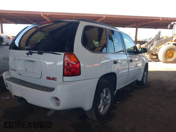 2004 GMC Envoy SLT with VIN 1GKDS13S442217242, listed as a IAAI auction lot 42573887 with 210,296 mi miles and . Bid and sale history available at DreamBid. Image 4.