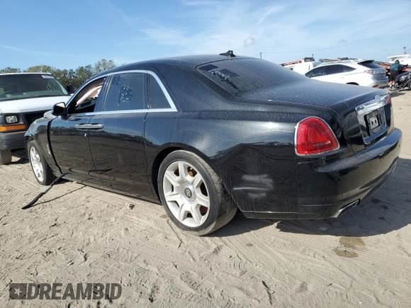 2012 Rolls-Royce Ghost z VIN SCA664S57CUX50671, wystawiony jako Copart lot #84172874 z przebiegiem Nie podano mil oraz Szkody całkowita. Historia ofert i sprzedaży dostępna na DreamBid. Obrazek 2.