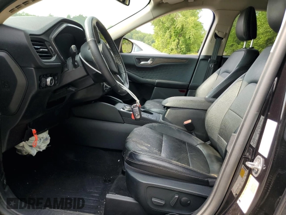 2020 Ford Escape Titanium с VIN 1FMCU9J97LUA20595, выставлен на аукционе Copart как лот 59476745 с пробегом 74 518 миль миль и Списание • Salvage title. История ставок и продаж доступна на DreamBid. Изображение 7.