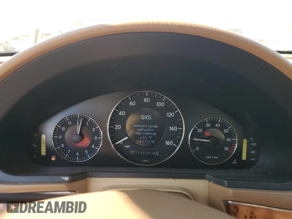 2007 Mercedes-Benz E 550 with VIN WDBUF72X37B021084, listed as a Copart auction lot 48695235 with 119,538 mi miles and Salvage Title. Bid and sale history available at DreamBid. Image 9.