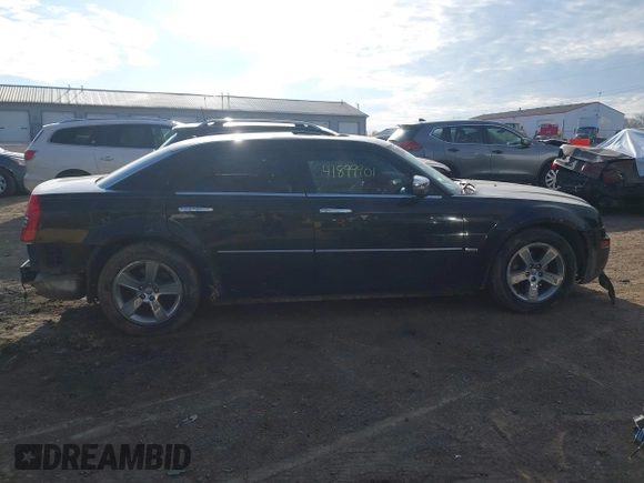 2010 Chrysler 300 Touring with VIN 2C3CA5CV2AH134024, listed as a IAAI auction lot 41899901 with 164,797 mi miles. Bid and sale history available at carsss.com. Image 14.