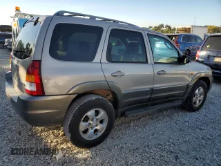 2002 Mazda Tribute LX with VIN 4F2YU091X2KM22268, listed as a Copart auction lot 82915484 with 70,684 mi miles and Clean Title. Bid and sale history available at carsss.com. Image 3.