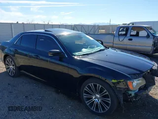 2013 Chrysler 300 with VIN 2C3CCABT2DH600560, listed as a IAAI auction lot 41725688 with 158,397 mi miles. Bid and sale history available at carsss.com. Image 1.