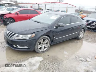 2013 Volkswagen CC Sport with VIN WVWBP7AN2DE506977, listed as a IAAI auction lot 41440929 with 62,385 mi miles. Bid and sale history available at carsss.com. Image 2.