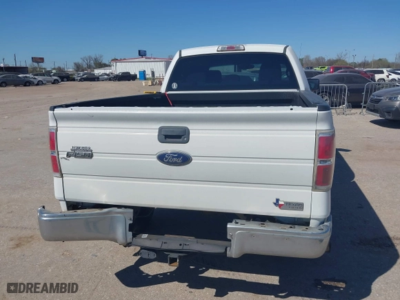 2013 Ford F-150 XL with VIN 1FTFW1CF7DFA66868, listed as a IAAI auction lot 41784163 with 218,303 mi miles. Bid and sale history available at carsss.com. Image 16.
