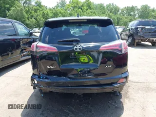 2018 Toyota RAV4 XLE with VIN 2T3WFREV3JW468450, listed as a IAAI auction lot 42528560 with 77,513 mi miles and . Bid and sale history available at DreamBid. Image 16.