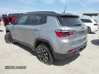 2021 Jeep Compass Trailhawk with VIN 3C4NJDDB9MT527131, listed as a IAAI auction lot 41789250 with 54,180 mi miles and . Bid and sale history available at carsss.com. Image 3.