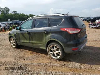 2013 Ford Escape Titanium z VIN 1FMCU0J94DUB90197, wystawiony jako Copart lot #59289925 z przebiegiem 200 006 mil mil oraz Czysty tytuł • Clean title. Historia ofert i sprzedaży dostępna na DreamBid. Obrazek 2.
