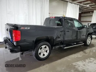 2017 Chevrolet Silverado 1500 LT with VIN 1GCVKREC0HZ141018, listed as a Copart auction lot 52708255 with 96,790 mi miles and Salvage Title. Bid and sale history available at DreamBid. Image 3.