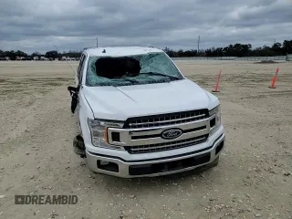 2020 Ford F-150 XL with VIN 1FTEW1CP4LKD98311, listed as a Copart auction lot 87605575 with 153,353 mi miles and Salvage Title. Bid and sale history available at carsss.com. Image 11.