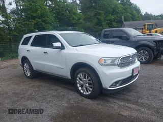 2015 Dodge Durango Citadel with VIN 1C4SDJET4FC688548, listed as a IAAI auction lot 42448775 with 157,297 mi miles and . Bid and sale history available at DreamBid. Image 1.