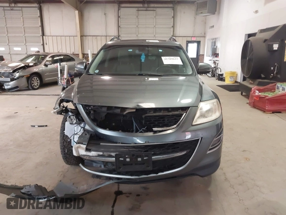 2012 Mazda CX-9 Grand Touring with VIN JM3TB3DV6C0360304, listed as a IAAI auction lot 41509627 with 163,986 mi miles. Bid and sale history available at carsss.com. Image 12.